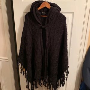 Black Cajon hooded poncho with toggle closure
